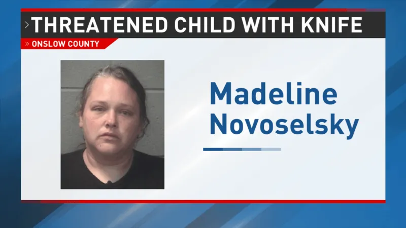 Jacksonville woman accused of threatening child with knife