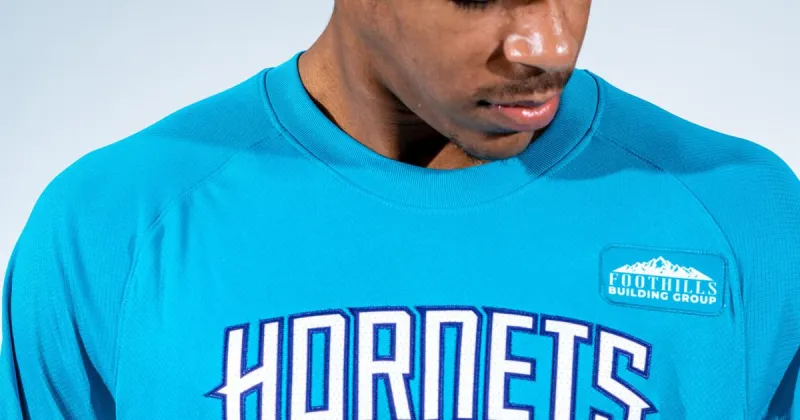 Clemmons construction company logo to appear on Charlotte Hornets shooting shirts