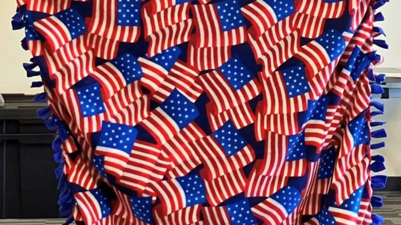 Handmade blankets bring comfort to military travelers at Albert J. Ellis Airport lounge