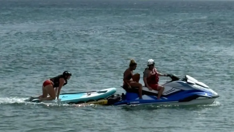 Two paddleboarders rescued after drifting a mile offshore in Kitty Hawk