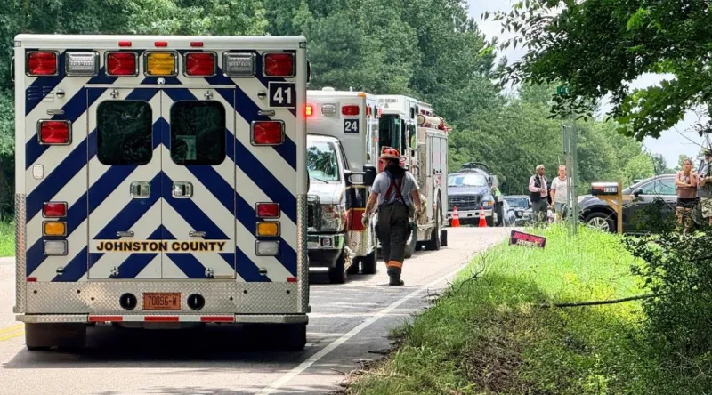 Two Vehicles Collide At Busy Intersection