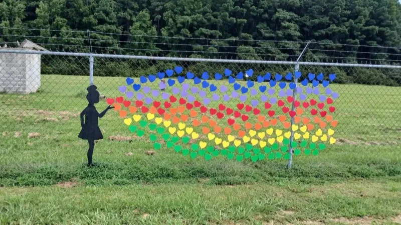 Wellness Garden adds new fence mural in Aurora as chamber invites fall visitors