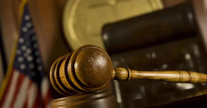 Burlington resident among four sentenced in $1.7 million money laundering scheme