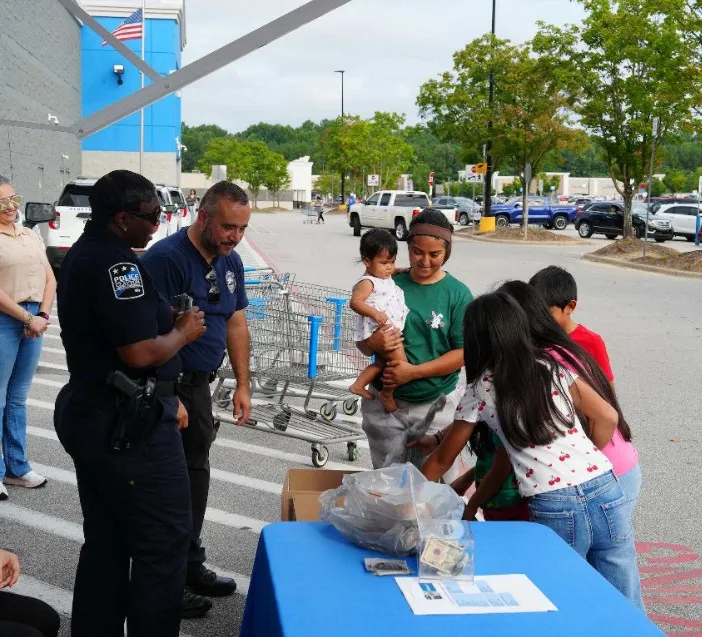 Clayton Police Help Equip Local Students For A New School Year