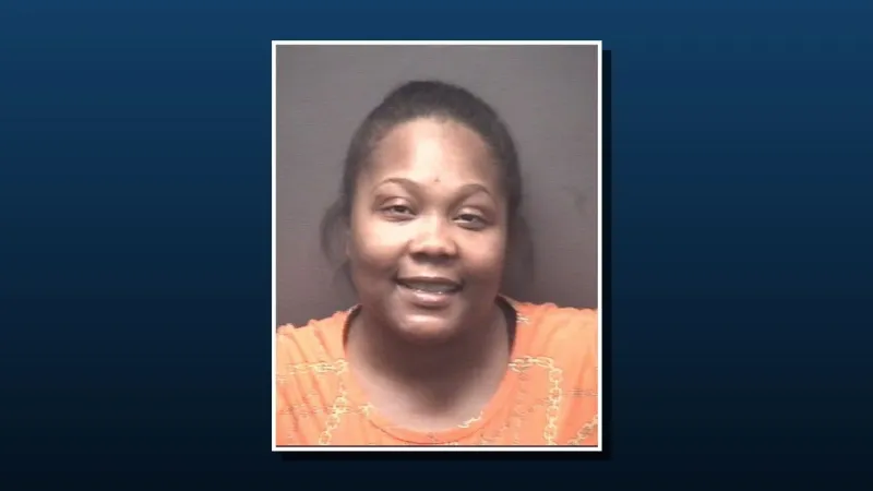 Greenville woman charged after knife assault, tire damage