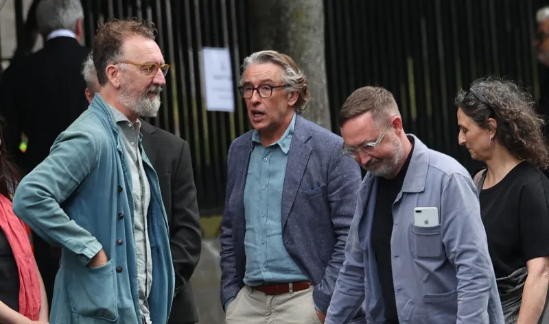 Bono, Eddie Vedder among mourners at funeral of songwriter Glen Hansard