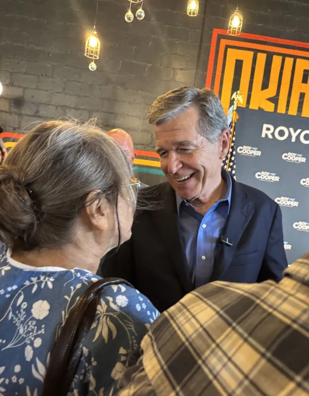 Senate candidate Roy Cooper rallies supporters during downtown campaign stop