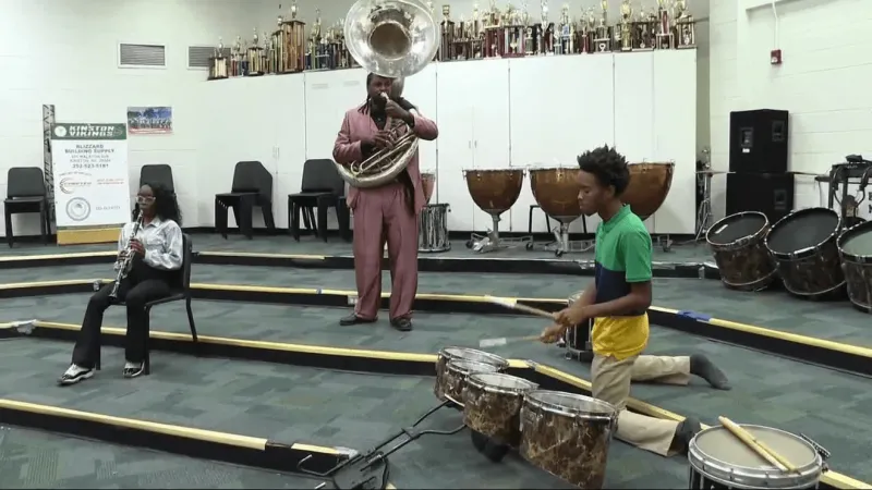 Kinston students return to school Monday as Kinston High marching band resumes practice