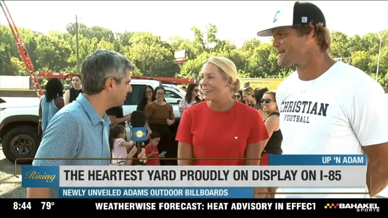 The HEARTest Yard new billboards on display around CLT