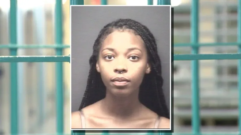 Greenville woman accused of pinning bystander in parking lot crash, seriously injuring him