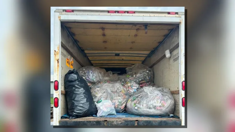 Wayne County Habitat fills box truck with donated cans in recycling drive