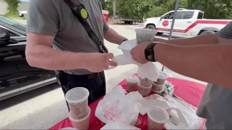 BBQ pig cooking contest sells plates to support Morehead City fire and EMS