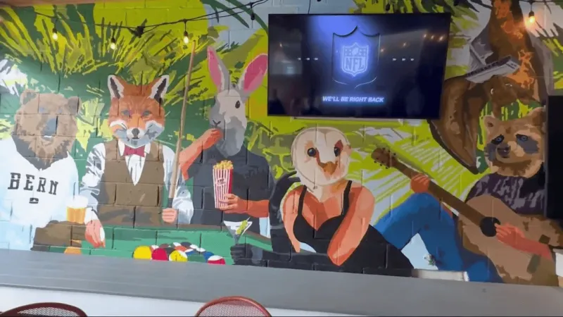 More than 400 residents paint and unveil Party Animals mural at Flying Fox in New Bern