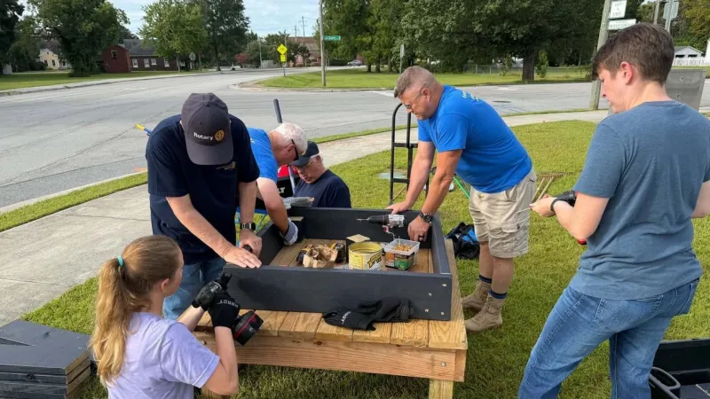 Community service drives Rotary volunteers to plant roots at New River YMCA Youth Center