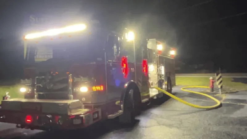 Brush fire involving junk cars extinguished near Chinquapin home