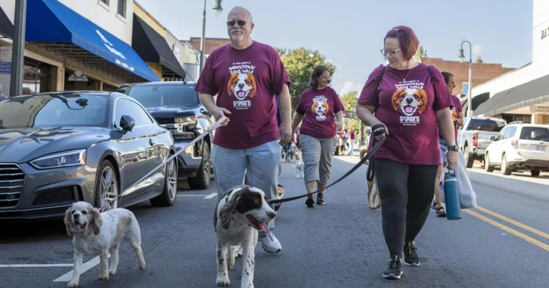"A barking good time:" Pet lovers get fired up for 21st annual Downtown Dog Walk