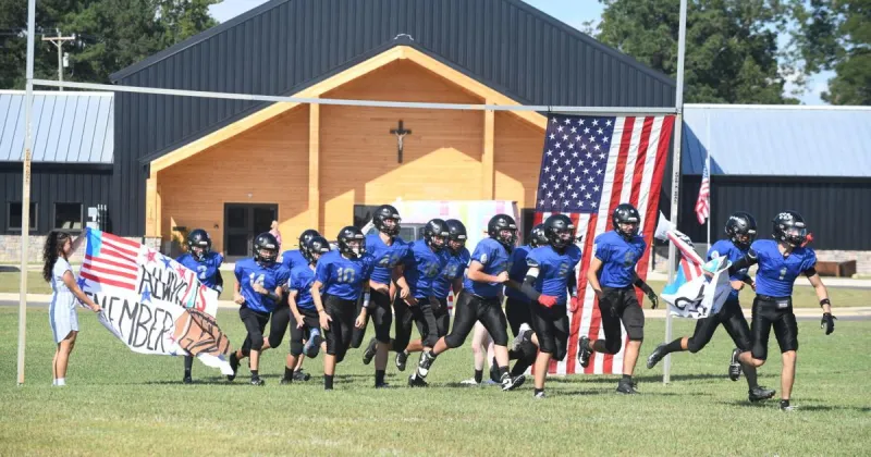 Father Capodanno Hosts First Football Game on New Campus