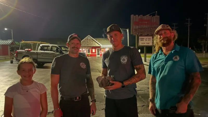 Kitten is safe after Atlantic Beach firefighters coax it out from beneath a vehicle