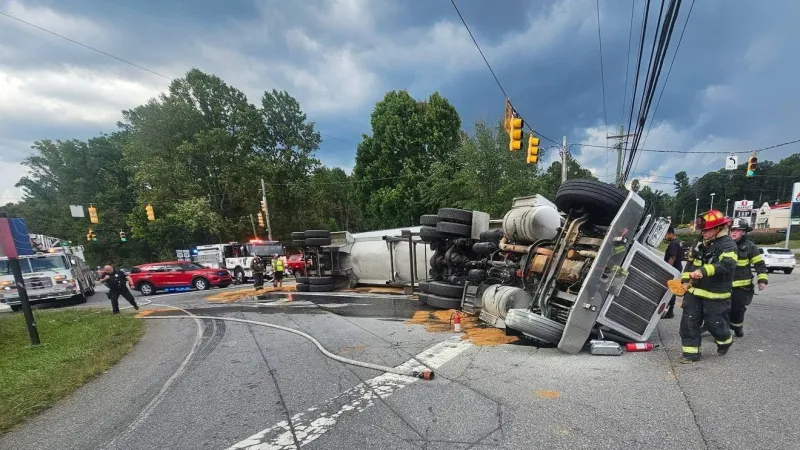 Tractor-trailer rollover shuts down Woodfin road for hours: police