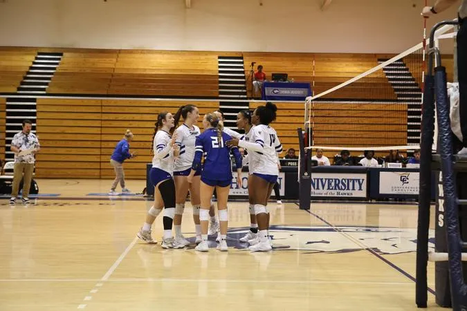 Hawks Rally Past Trojans in Five to Stay Unbeaten in Divisional Play