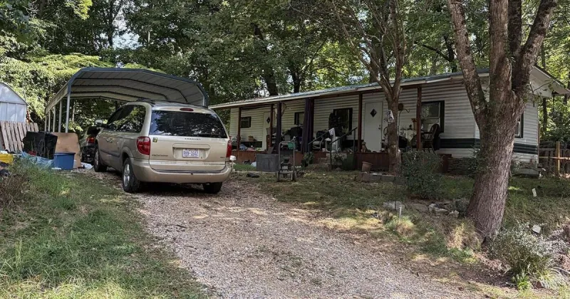Search warrant says Old Fort woman told deputies she shot man found dead on front porch