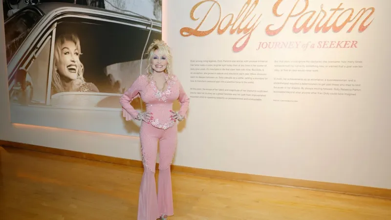 It's officially Dolly Parton Day, with parades, pink lights and book drives