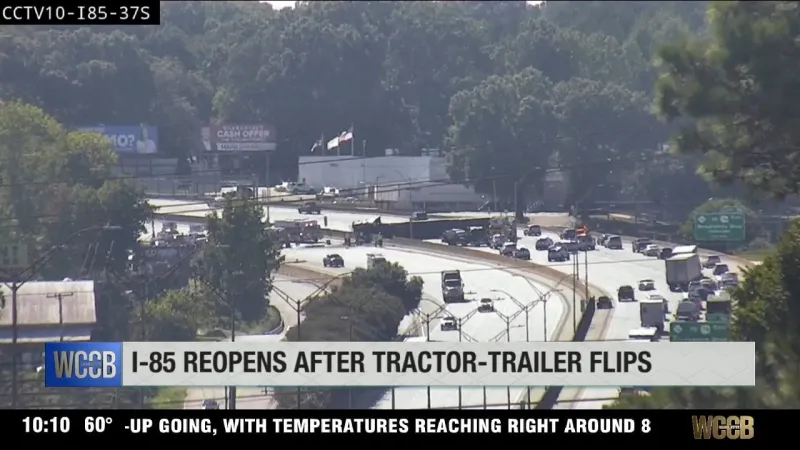 Miles of gridlock after tractor trailer flips over and lands across four lanes of I-85 during Friday rush hour
