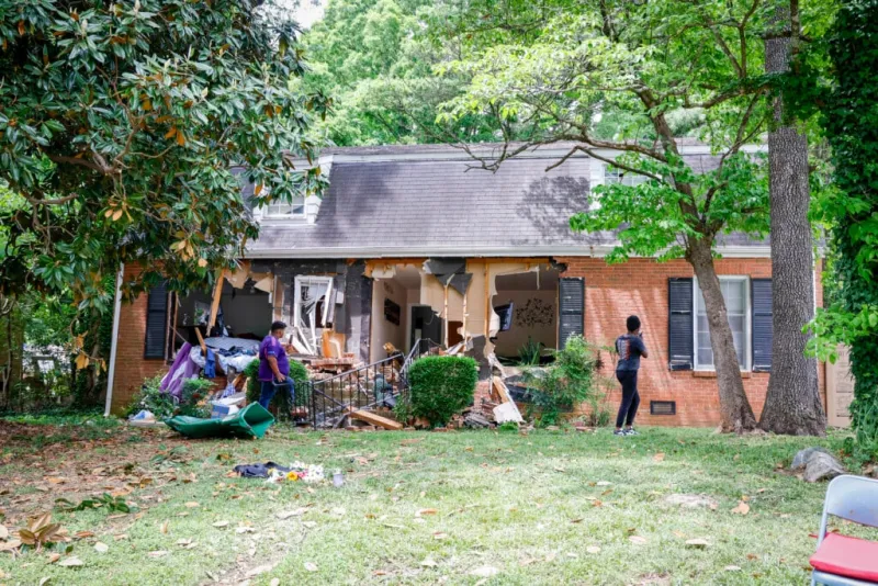 Woman charged with buying gun used in 2024 shooting that killed four law enforcement officers