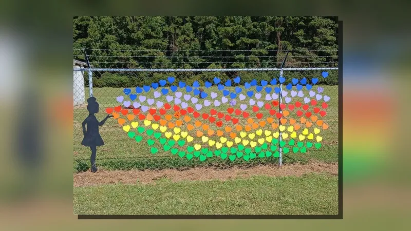Donated hearts spark a growing garden fence display in Aurora-Richland Township