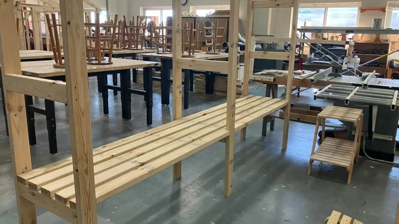 Croatan High carpentry class finishes first storage rack for Carteret Kraken athletes