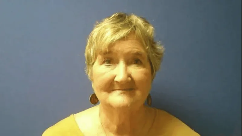 Clinton woman charged with murder in fatal house fire