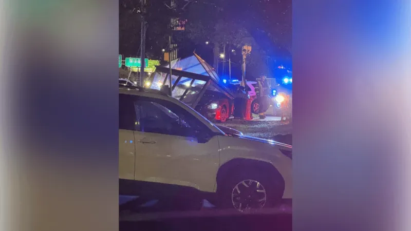 Car crashes into bus stop on Patton Avenue in Asheville