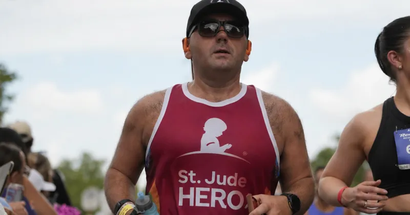 Hickory man runs first marathon to fight childhood cancer