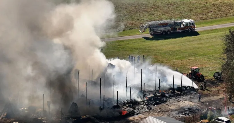 Fire destroys building used by Davie winery; smoke plume seen from miles away