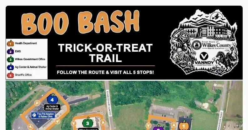 County staff giving candy during Boo Bash