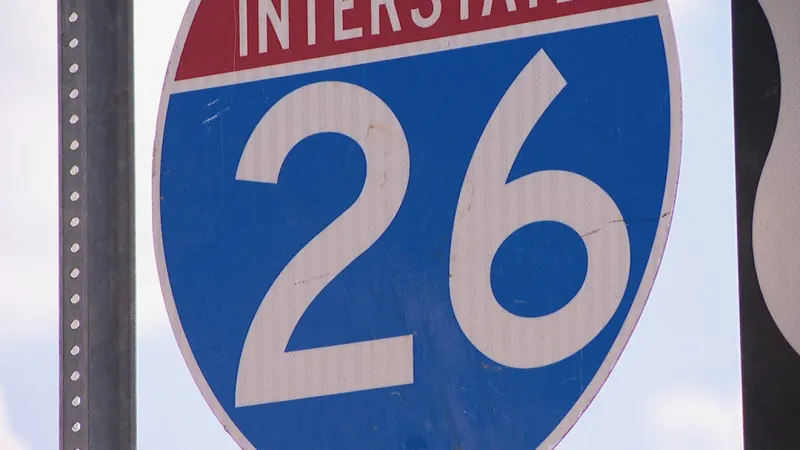 Car flips after colliding with Buncombe County sheriff's vehicle, highway patrol says