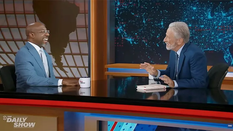 'I put up with politics': Sen Raphael Warnock confesses to Jon Stewart he is 'not in love' with the system