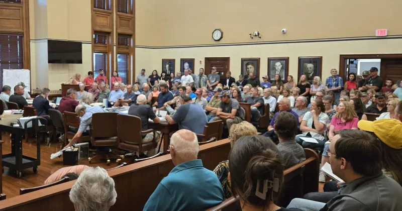 Crowd watches as planning commission recommends data center moratorium