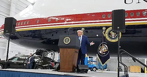 President Donald Trump unveils the new Air Force One, a converted Qatari jet