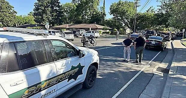Shooting suspect scoped out library before returning with a shotgun and killing 2