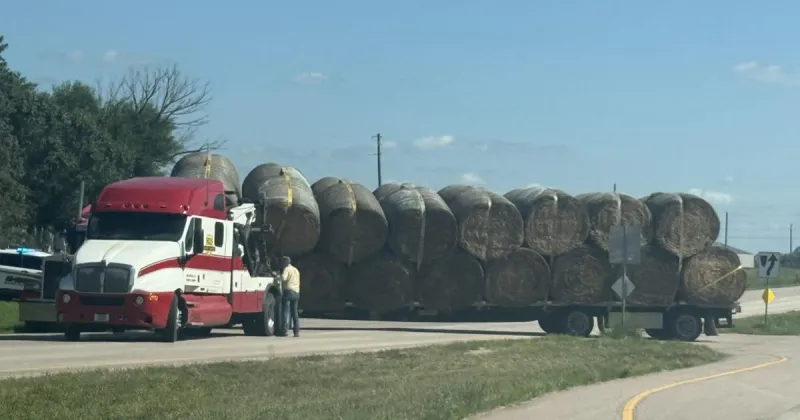 Semitrailer hauling hay shuts down northbound US 77