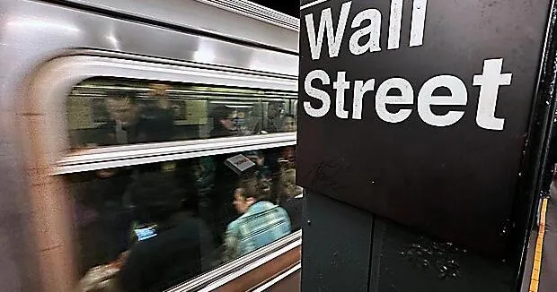 Stocks waver on Wall Street and crude oil prices drop 5% as Mideast tensions cool