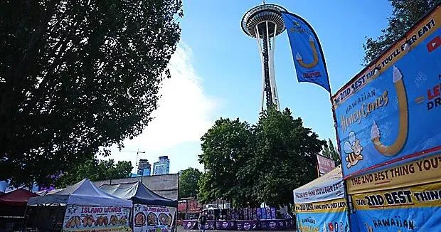 A shootout that killed 3 at festival near Seattle's Space Needle may have been gang-related