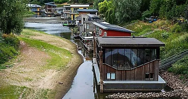 Dry, hot summers are putting Dutch dikes at risk and threatening river trade