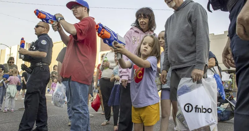 Community celebrates National Night Out: Families turn out as Broadway becomes a block party