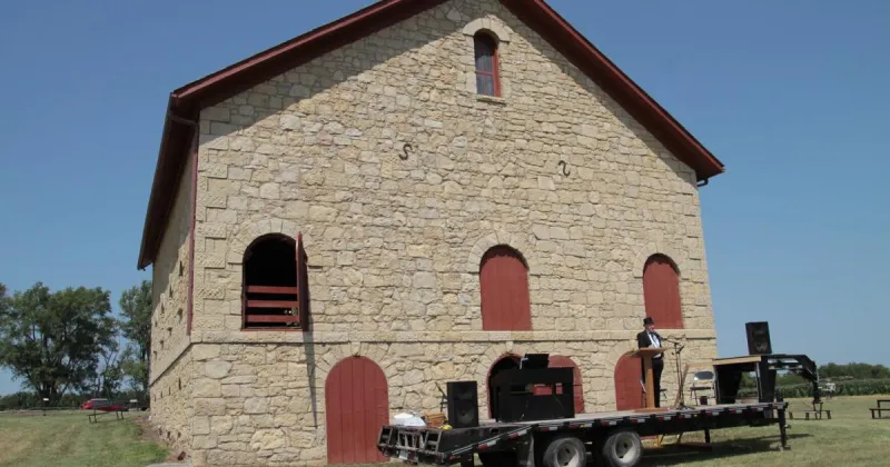 Stone barn hosting tractor, quilt show and pancake breakfast