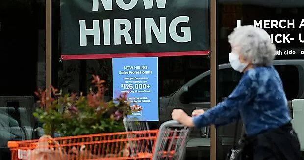 US unemployment claims dropped to 206,000 last week with layoffs still sparse