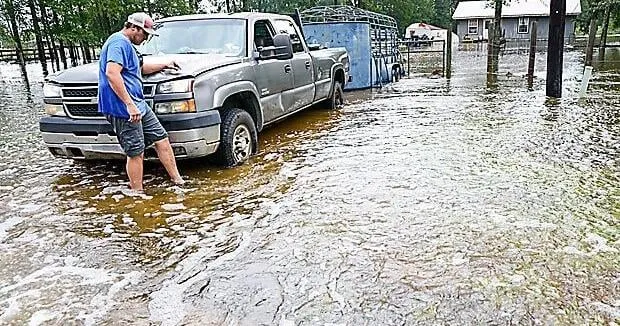 Former Tropical Storm Edouard lingers over Texas, flooding homes and roadways