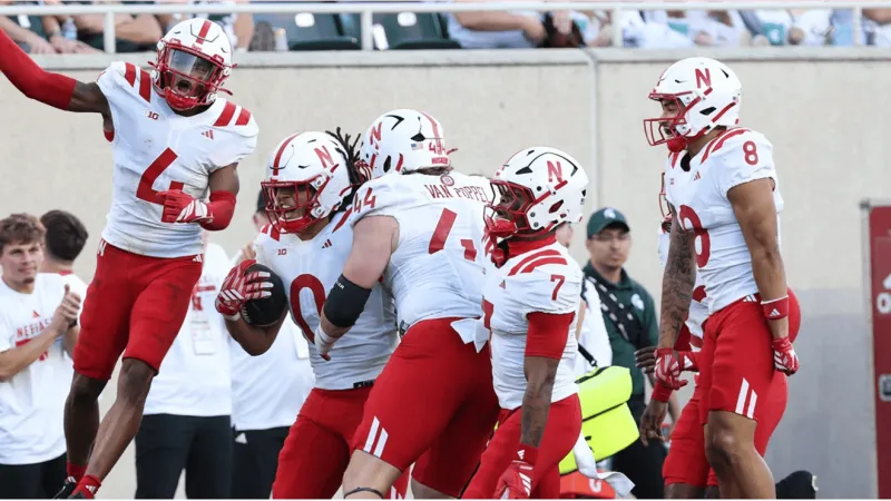 Huskers down spartans to remain undefeated