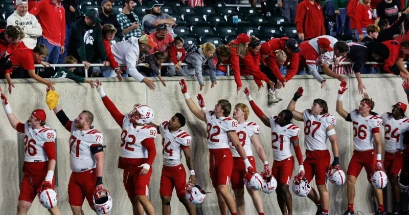 'Got to': A Nebraska win, then an impromptu round of high-fives between players and fans